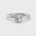 Load and play video in Gallery viewer, Oval Cut Real Moissanite Bezel Set Solitaire Ring 14K Gold Plated