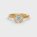Load and play video in Gallery viewer, Round Cut Real Moissanite Bezel Set Solitaire Ring 14K Gold Plated